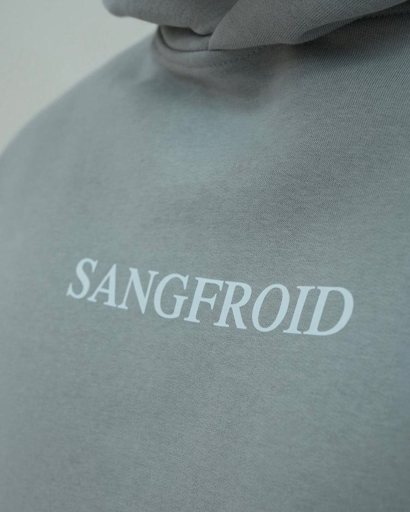 Gray hoodie with 'SANGFROID' branding on a light gray background
