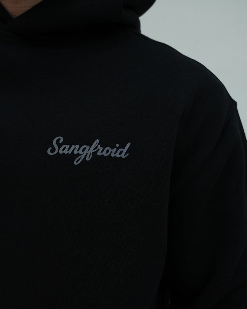 Black hoodie with 'Sangfroid' branding on a plain background