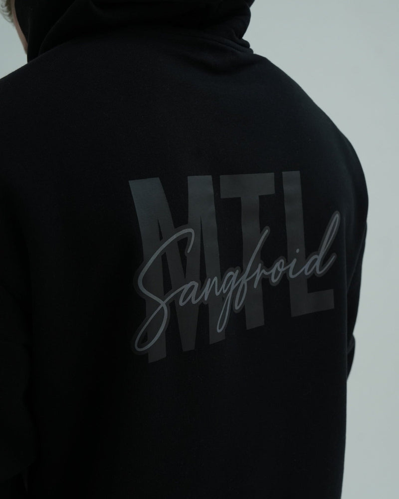 Black hoodie with 'MTL Sangfroid' text on the back against a light gray background