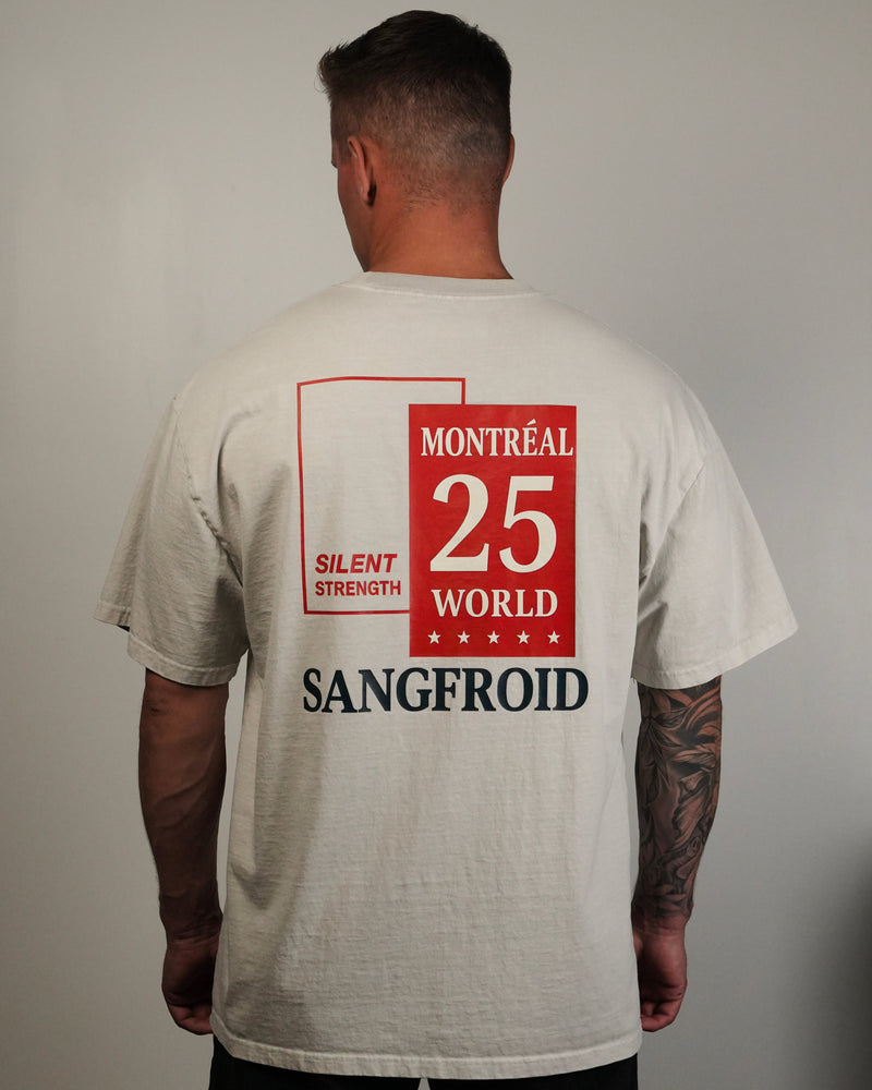 Person wearing a t-shirt with text on the back against a plain background