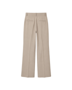 A pair of beige wide-leg trousers shown from the back, featuring a flat waistband, belt loops, and two welt back pockets, displayed on a solid white background.