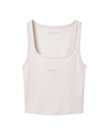 A light beige ribbed tank top with a scoop neck, featuring the brand name 'SANGFROID' in tonal embroidery on the chest, displayed on a clean white background.
